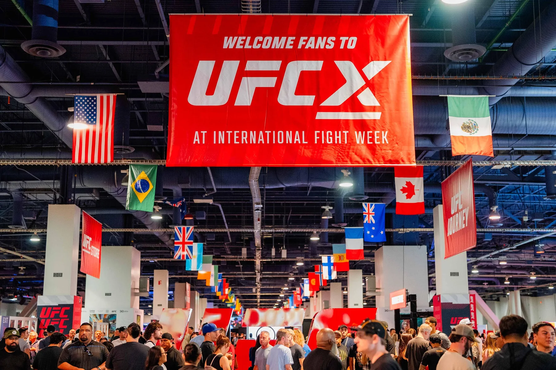 UFC fans attending an official fight-week fan event with ticketed access