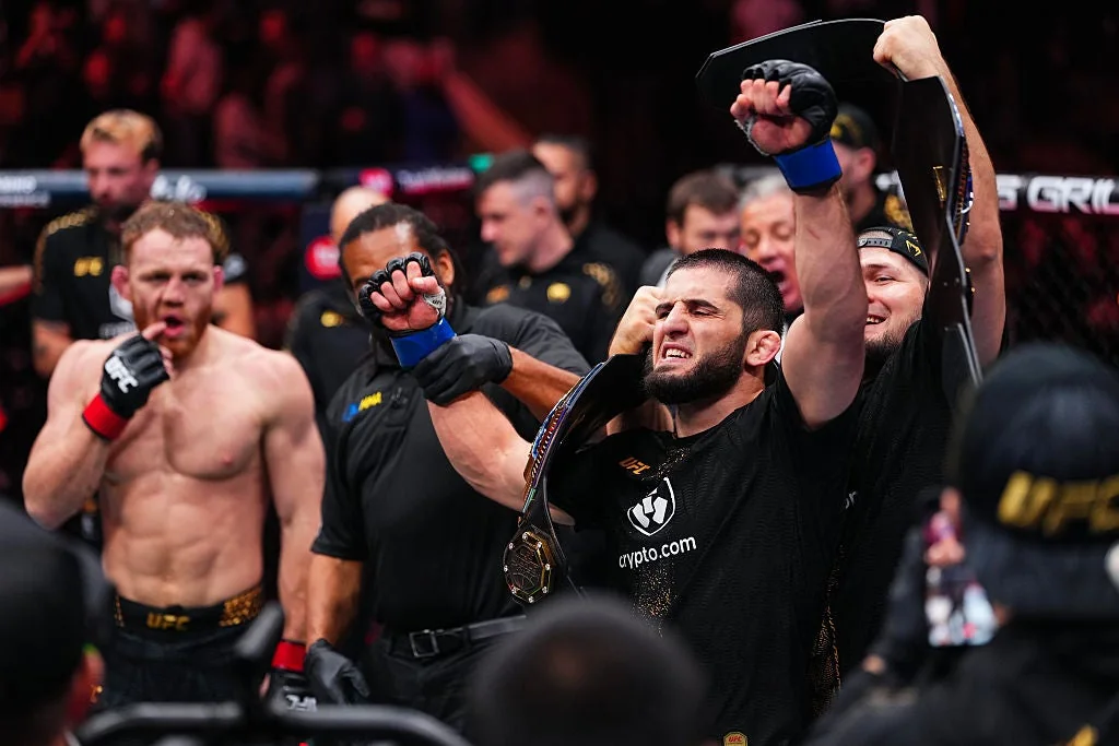 Islam Makhachev reacts after winning the UFC 322 welterweight championship fight