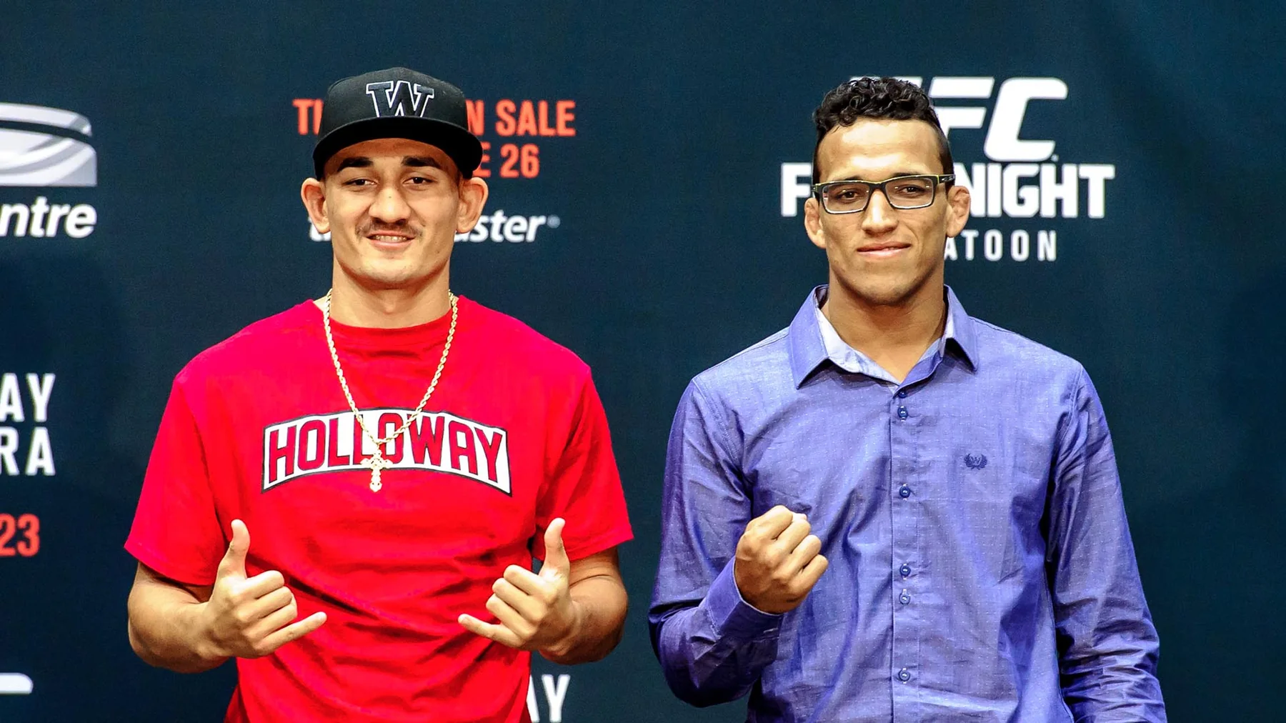 Max Holloway and Charles Oliveira pose together before their first UFC meeting in 2015