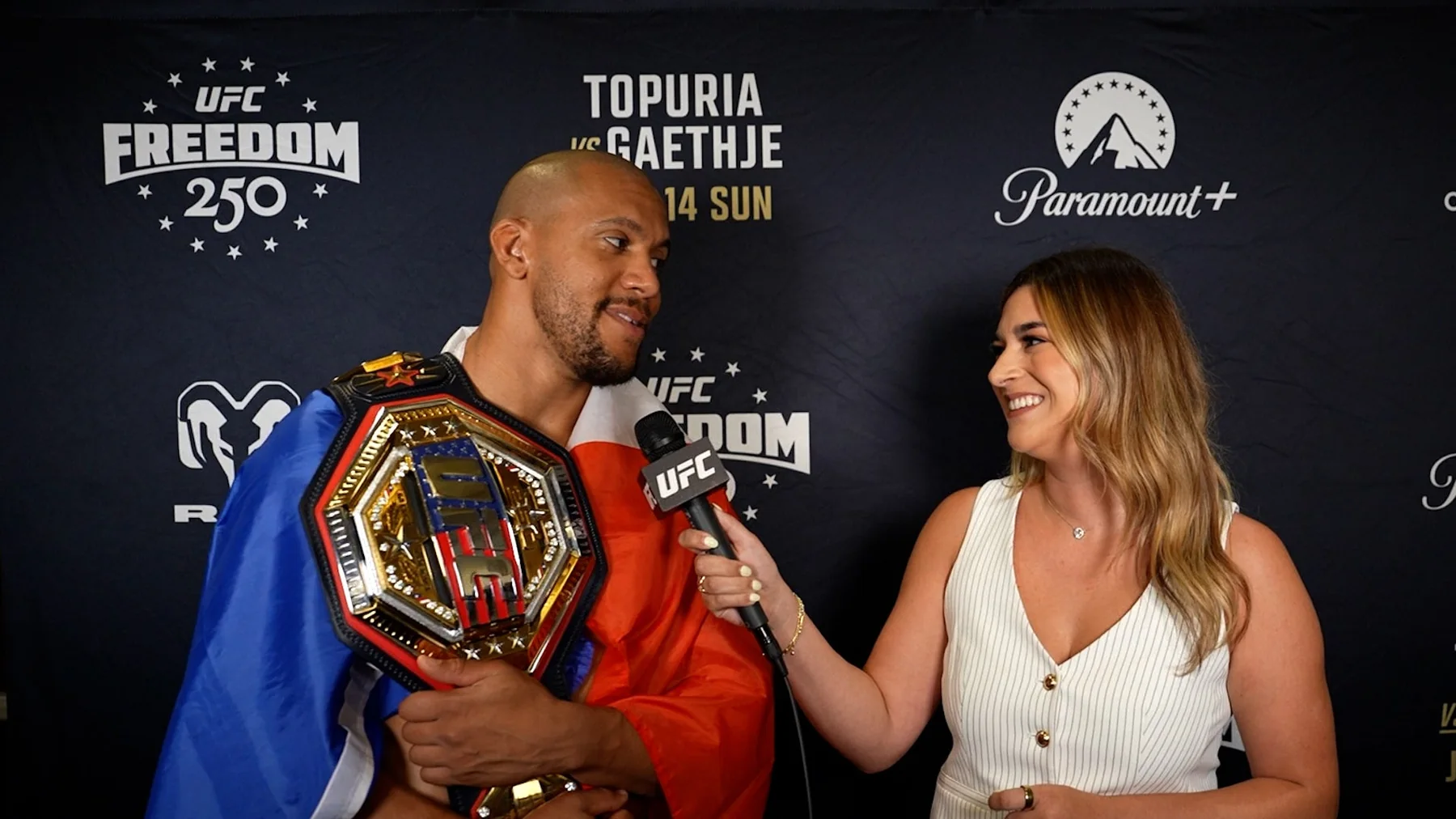 Ciryl Gane holding the UFC interim heavyweight championship after Freedom 250